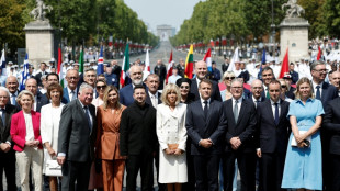 France flaunts firepower, unity with allies in huge parade