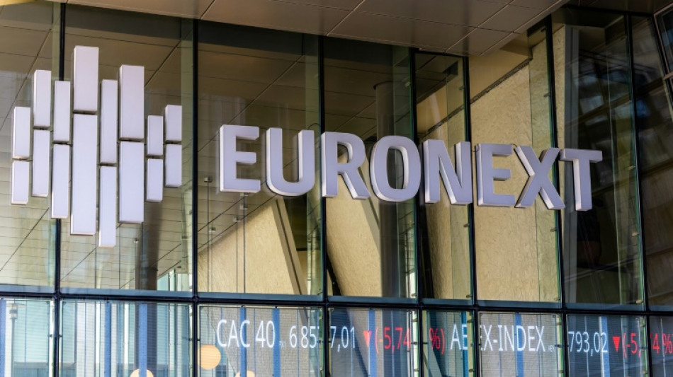 Les Bourses mondiales prudentes face aux tensions commerciales, en pleine saison de résultats