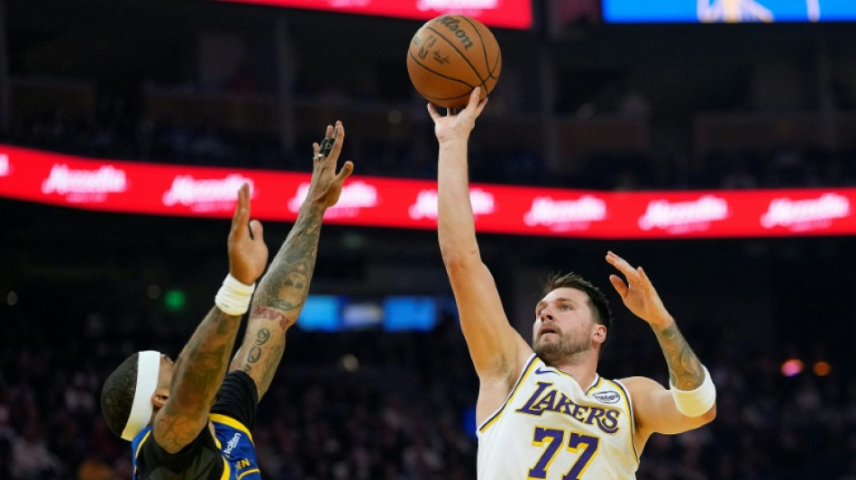 Doncic shines as Lakers cruise past depleted Warriors