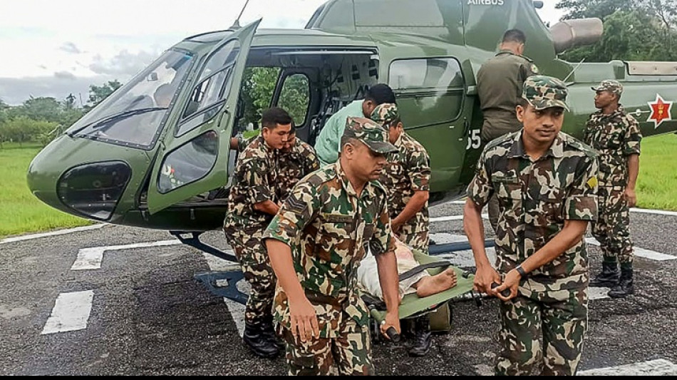 Rescuers scramble to deliver aid after deadly Nepal, India floods