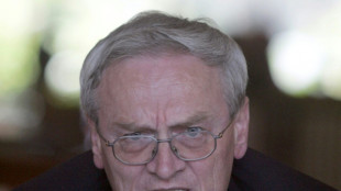 Germany arrests ex-spy chief on suspicion of giving secrets to foreign powers