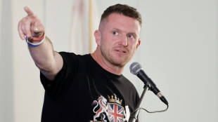 Tens of thousands turn out for UK far-right rally, counter demo