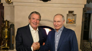 German leader outraged at Schroeder birthday visit to Putin