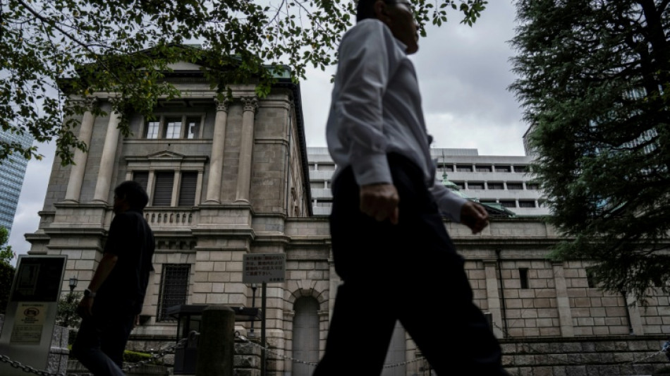 Stock markets retreat after central bank rate hikes