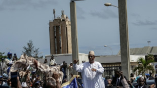Ex-president Sall arrives back in Senegal for meeting with successor