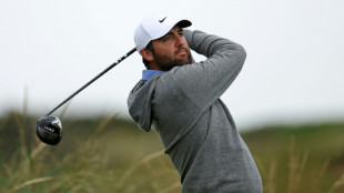 Charging Scheffler closes on British Open lead