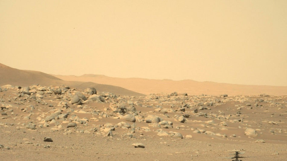 NASA regains contact with mini-helicopter on Mars