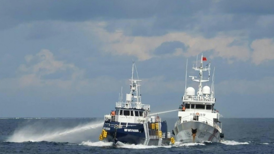China, Philippines trade blame over boat collision in disputed sea
