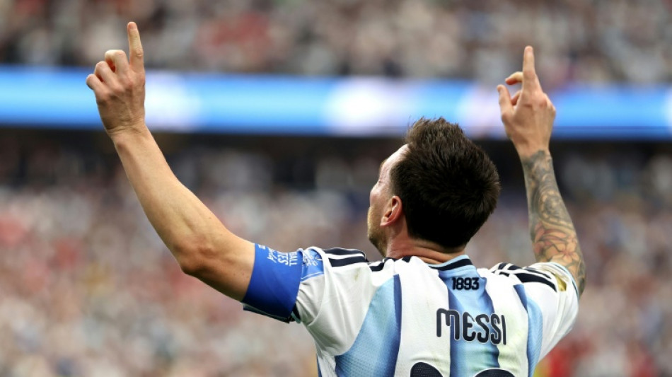 Magic Messi makes World Cup history to send Argentina into last 32