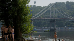 Escaping heat, forgetting war: Kyiv locals hit the beach