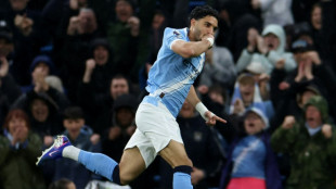 Man City see off Palace to keep pressure on Arsenal