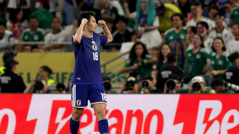Japan stroll to victory over Tunisia in World Cup's 1,000th game