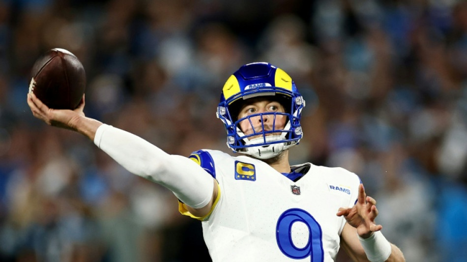 Rams survive Panthers scare to advance in NFL playoffs