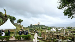 Pope walks in Augustine's footsteps on Algeria trip marred by suicide attacks